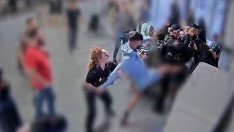 CCTV footage of alleged assault on police at Manchester Airport shown to jury
