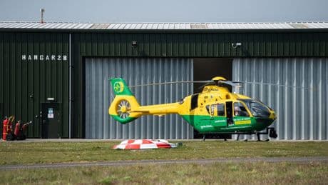 Helicopter crashes in field on Isle of Wight as air ambulance on scene