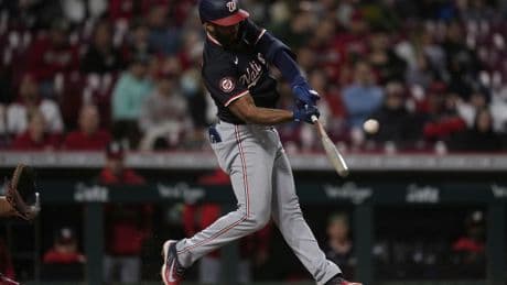 Rosario powers Nationals to win over the Reds