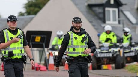 Four arrested during Donald Trump's visit which saw over 7000 police officers mobilised