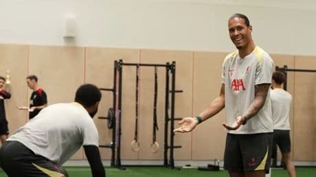 Virgil van Dijk can't help but laugh as he ridicules his best friend in Liverpool training