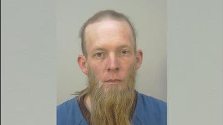 Cops say Wisconsin shooter who killed 2 had models of school in her home as prosecutors charge dad in case