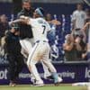Sánchez hits leadoff homer and game-ending triple to lift Marlins over Cubs 8-7