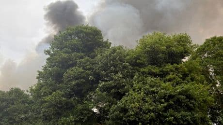 Huge fire rips through former RAF base as explosions heard and smoke seen from miles away