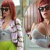 Braless Lily Allen shows off her new boob job in a see-through blue mesh top while celebrating her 40th birthday