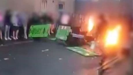 Shock moment Ballymena rioters hurl missiles at cops as violence erupts