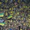 Télévision ou stade : le cœur des fans balance