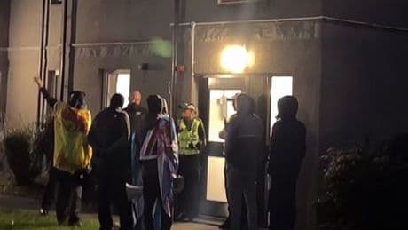 Two men charged with hate crime after asylum seeker protest at Aberdeen student flats