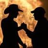 Firefighter is attacked as effigies of Kneecap burn along with 300 other bonfires across Northern Ireland ahead of Orange Order parades