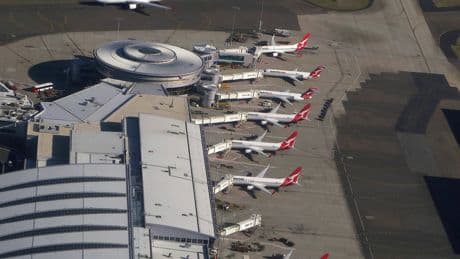Man arrested after police gun fired during scuffle at Sydney Airport