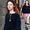 Britpop superstar's daughter, 25, cuts a casual figure as she strolls through Notting Hill - but can you guess who her very famous father is?