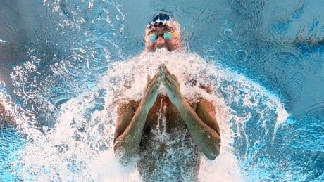 Above and below: AP photographers cover all angles at the World Aquatics