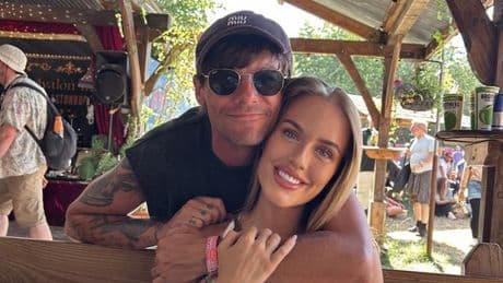 Lottie Tomlinson poses with brother Louis and girlfriend Zara McDermott at Glastonbury
