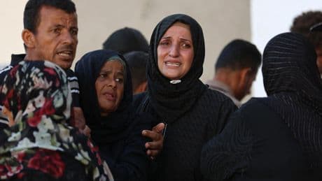 Israeli attacks at Gaza aid distribution point, school and camp kill at least 21