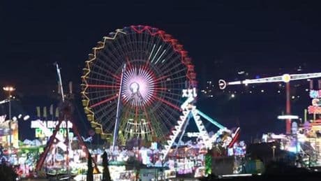 Detienen a un hombre por agredir a un policía local fuera de servicio en la Feria de Málaga durante el robo de un móvil