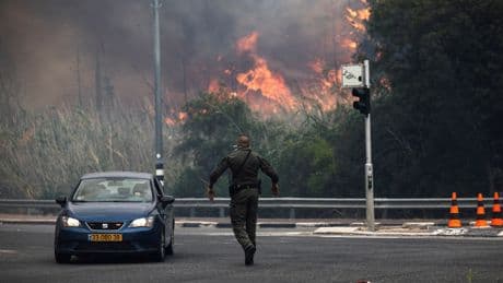 Wildfire in Israel burns 5,000 acres as drivers forced to flee cars