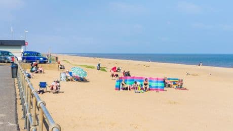 Man, 60, dies after ‘getting into difficulty’ in water while rescuing two ‘distressed’ children at popular UK beach