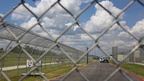 10 held in Texas immigration detention center shooting that was 'planned ambush,' US attorney says