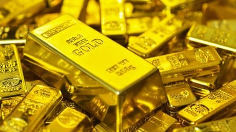 Gold is at a record price - why are people buying and how can I invest?