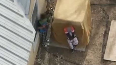 Young boys wearing Minecraft and Star Wars pyjamas in armed standoff with police