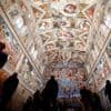 Vatican firefighters install chimney on roof of the Sistine Chapel for papal election