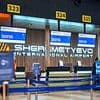 Boy, two, 'in a coma after airline passenger throws him to the floor in airport lounge'