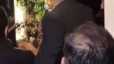 Moment Ronaldo staggers out of restaurant and is helped into car under sheet with his football club’s fans left fuming