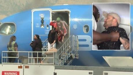 Unruly flyer is ‘picked up like a child’ and restrained by fellow passenger