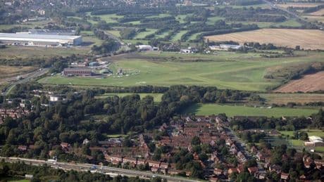 Plane crash in Manchester leaves man fighting for his life & another injured after light aircraft flips upside down