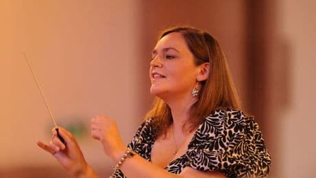 Caitlin's joy as she marks 10 full seasons of conducting Lanarkshire Cecilian Orchestra