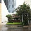 Aussie woman caves to developers and sells her home: After holding out for years between two towering apartment blocks - she has secured a jaw-dropping price