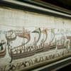 Tapisserie de Bayeux : trop fragile pour voyager outre-Manche ? Le prêt d'Emmanuel Macron inquiète les défenseurs du patrimoine