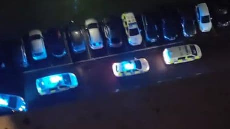 Two police officers rushed to hospital after disturbance at Glasgow tower block
