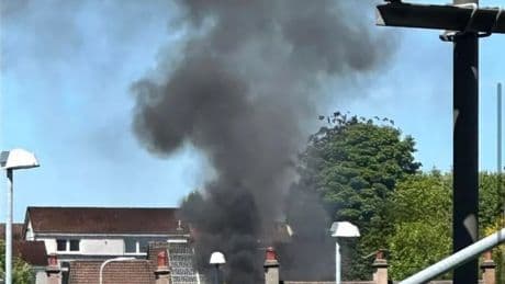 Scots home bursts into flames as 'thick black smoke seen for miles'