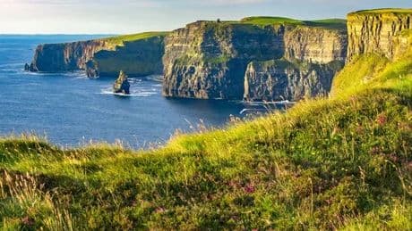 Tourist, 12, slipped in puddle before falling off cliff to his death, inquest told