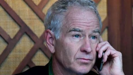 John McEnroe shouted six-word message down the phone after Wimbledon champ sold trophies