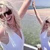 Holly Willoughby wows in a white swimsuit as she lives it up on the beach during sun-soaked Portuguese holiday with sister Kelly