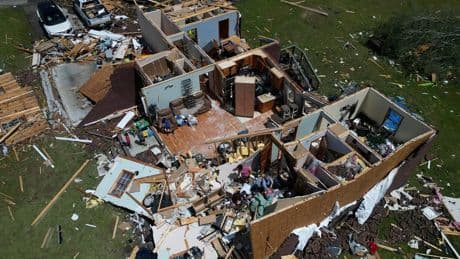 AP PHOTOS: Storm systems sweep across parts of the U.S. Midwest and South killing dozens
