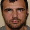 Gunman who assassinated prison officer after he exposed his relationship with female guard is jailed for 45 years