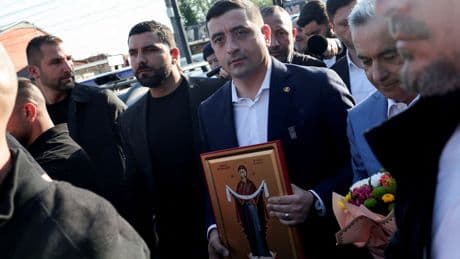 Romanian Nationalist Wins First Round of Presidential Voting