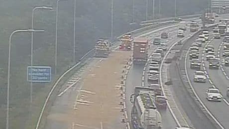 M60 and M62 LIVE: Traffic and delays as spillage closes major motorway lanes