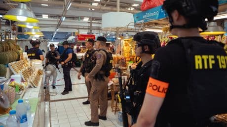 At least six killed by gunman in rampage at Bangkok market popular with tourists