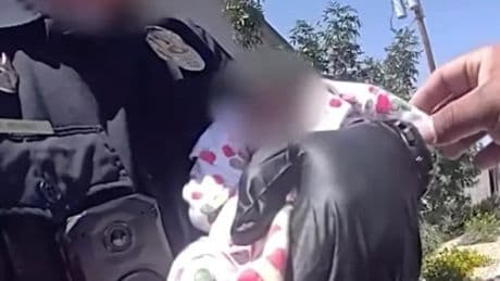 Starving newborn baby left home alone for days after mum died is rescued last-minute by cops ‘clinging to life’