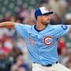 Abbott pitches 7 crisp innings as the Reds hold off the Cubs for a 6-2 win