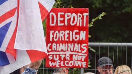Anti-migrant mob accuse officer of calling them fascists – but they misheard