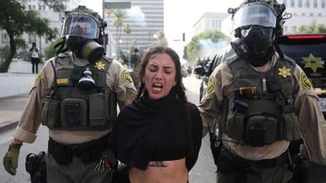 What to know about debate over protesters and ICE agents wearing masks amid immigration crackdowns