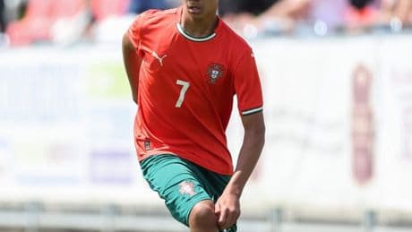 Cristiano Ronaldo Jr, 14, given dad’s number and strikes iconic pose as he makes Portugal debut with grandma watching