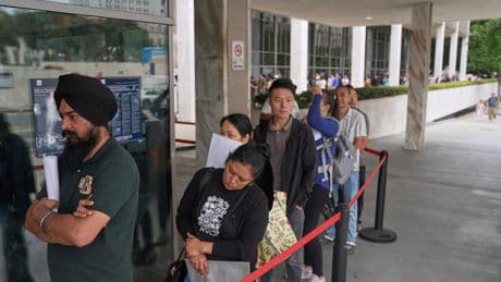 A day outside an LA detention center shows profound impact of ICE raids on families