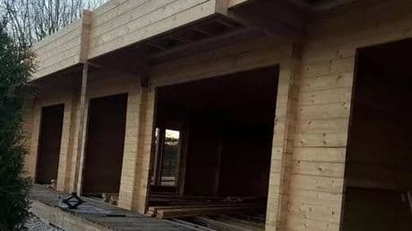Couple's 'idyllic' log cabin turns to 'eyesore' after order to tear it down or face prison