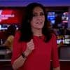 BBC news presenter Maryam Moshiri gets her steps up... by marching on the spot on live telly